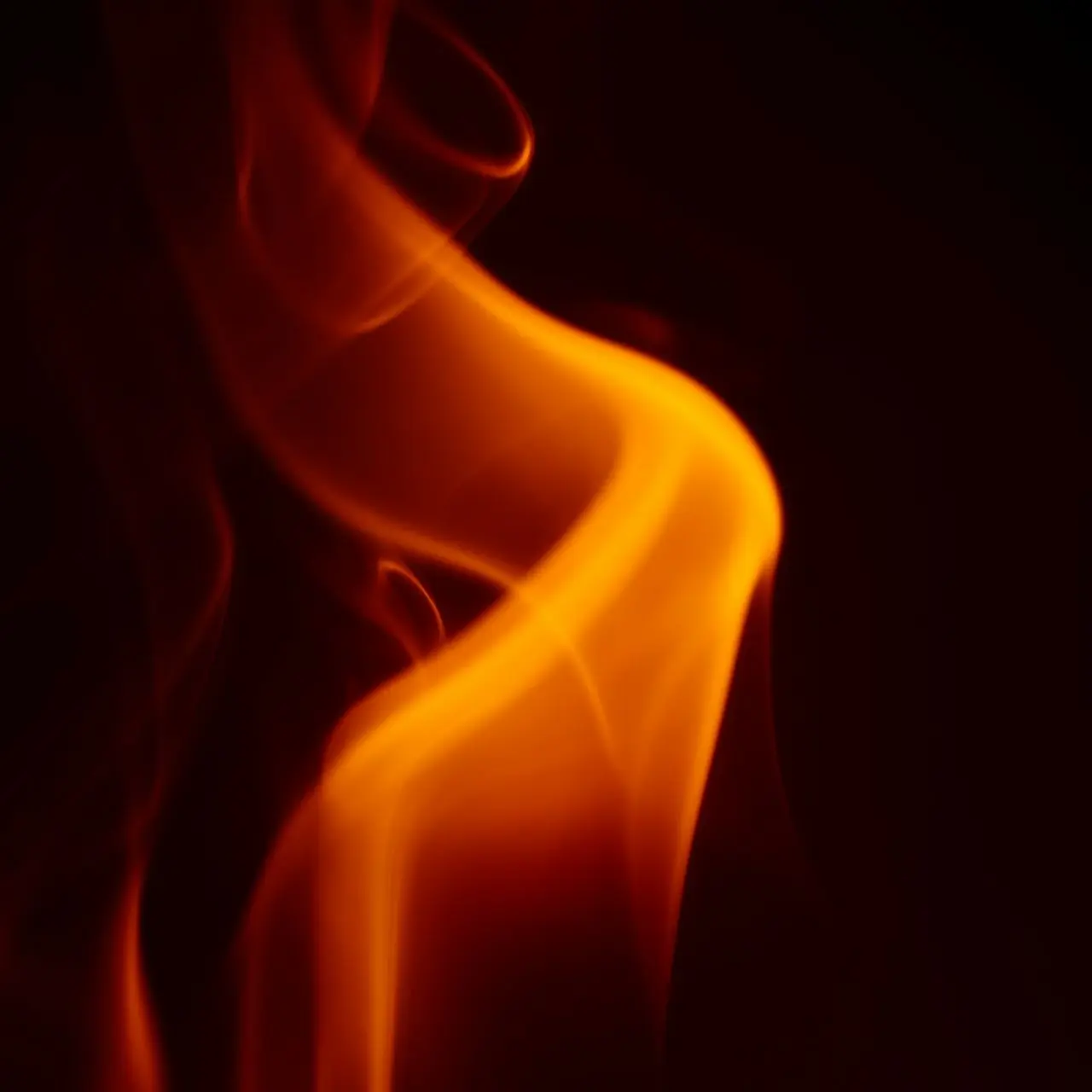 a blurry photo of a red and yellow substance